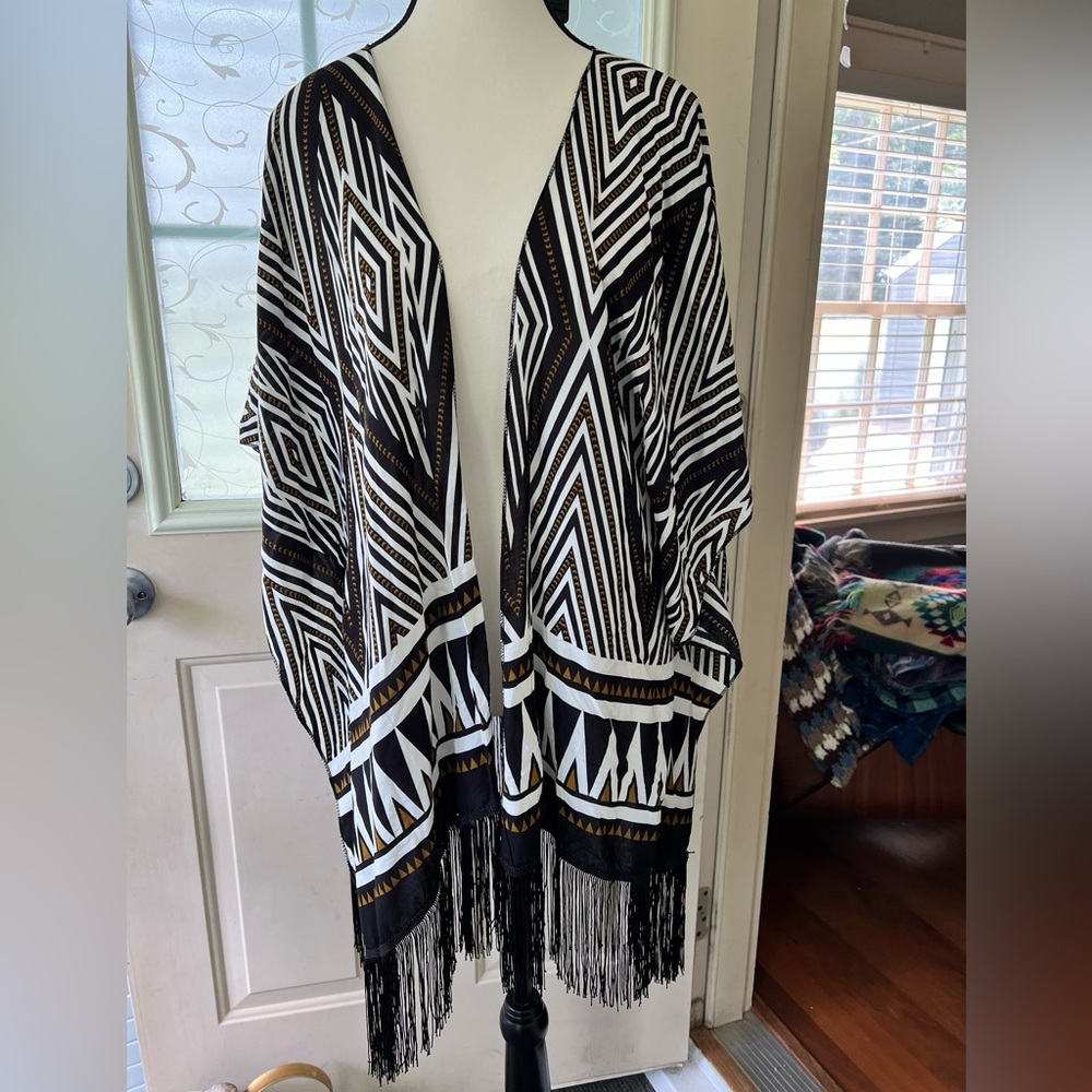 COPY - Poncho kimono wrap. This is a pretty black, brown and white linear print.